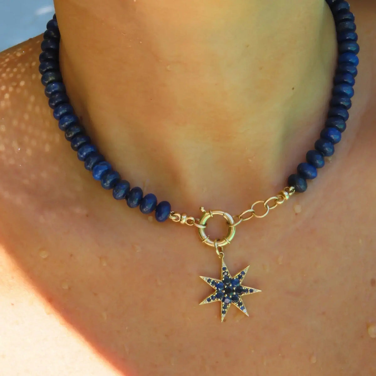 Lapis Lazuli Rondelle Bead Necklace with 14K Yellow Gold connector, styled with a star charm | JJ Jewelry Miami