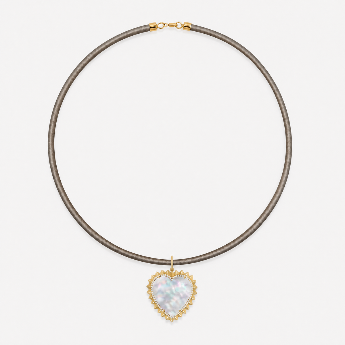 Mother-of-Pearl & Diamond Spiked Heart Pendant in 14K Yellow Gold, styled on a taupe cord choker | JJ Jewelry Miami