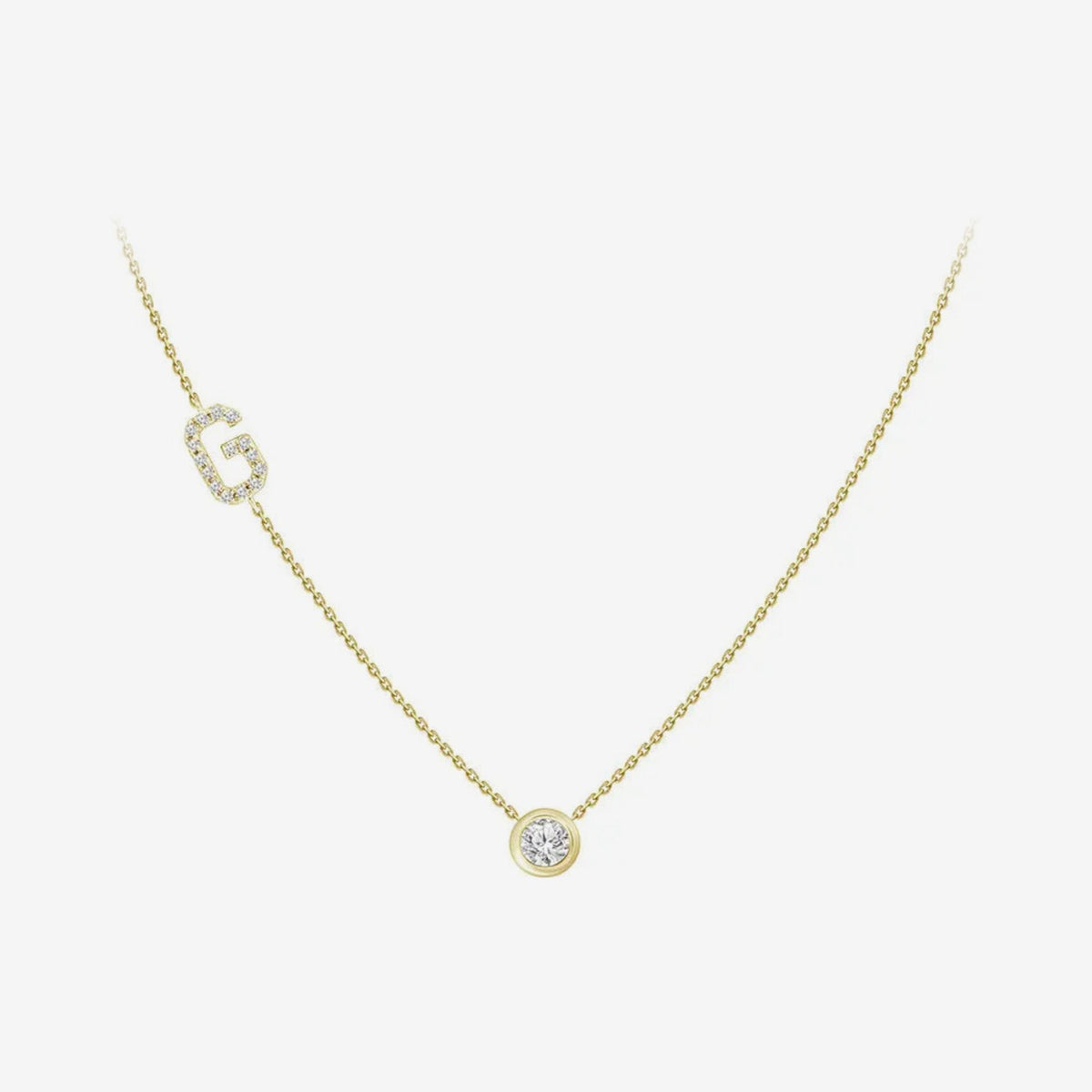 Pavé Diamond Initial Necklace, Letter G, in 18K Yellow Gold, gray background | JJ Jewelry Miami