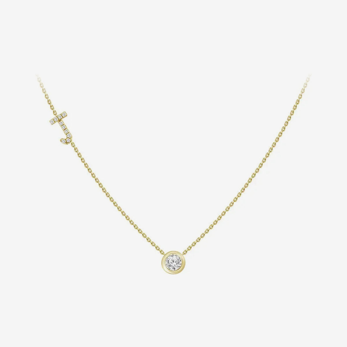 Pavé Diamond Initial Necklace, Letter J, in 18K Yellow Gold, gray background | JJ Jewelry Miami