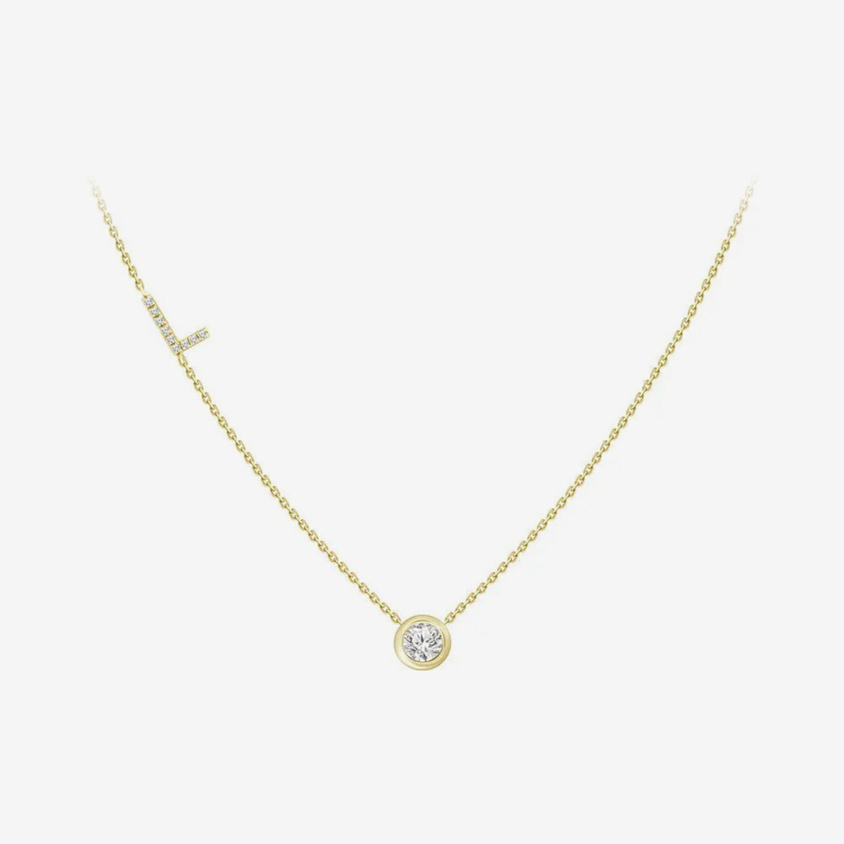 Pavé Diamond Initial Necklace, Letter L, in 18K Yellow Gold, gray background | JJ Jewelry Miami
