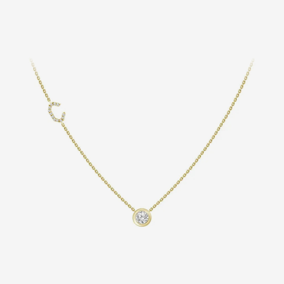 Pavé Diamond Initial Necklace, Letter C, in 18K Yellow Gold, gray background | JJ Jewelry Miami