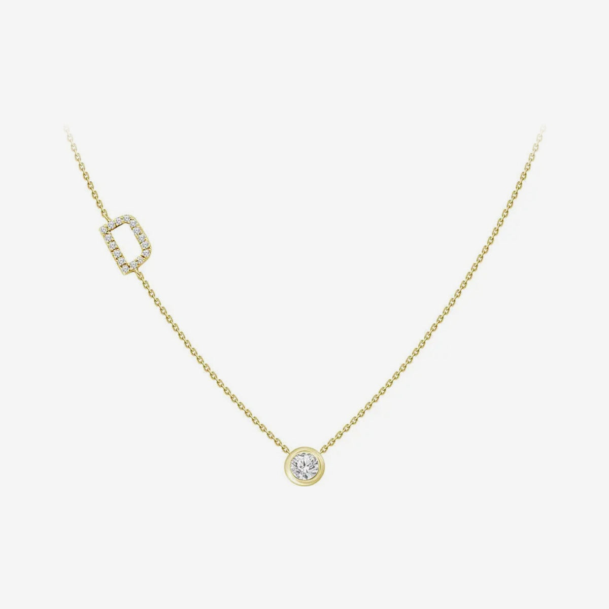 Pavé Diamond Initial Necklace, Letter D, in 18K Yellow Gold, gray background | JJ Jewelry Miami