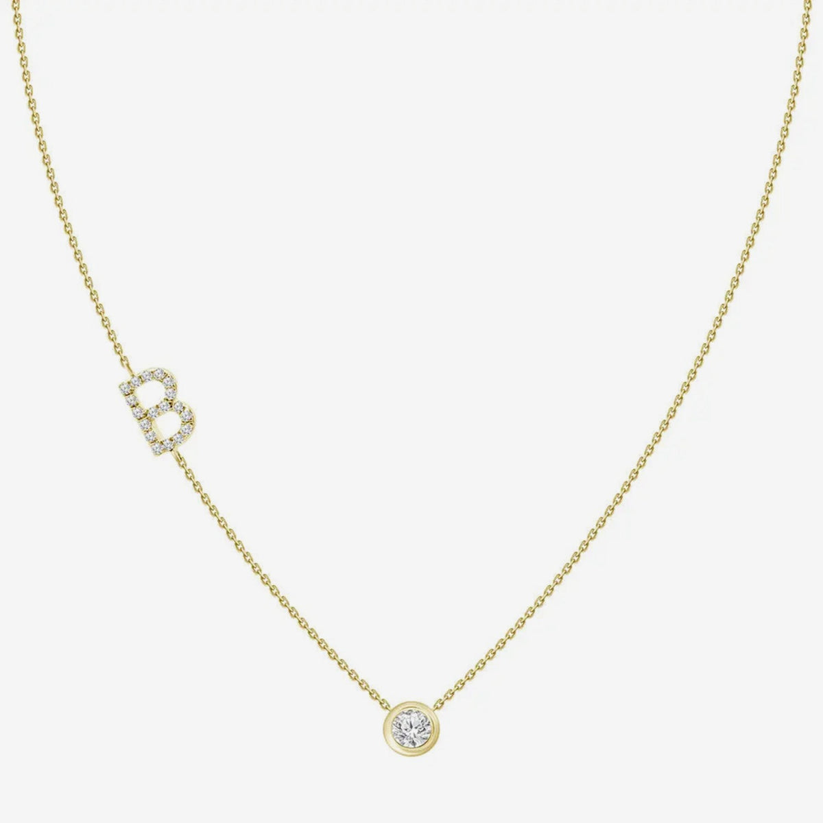 Pavé Diamond Initial Necklace, Letter B, in 18K Yellow Gold, gray background | JJ Jewelry Miami