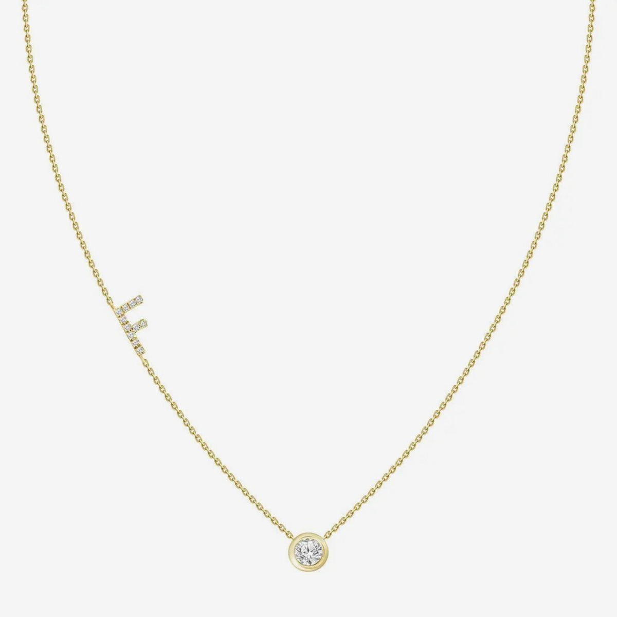 Pavé Diamond Initial Necklace, Letter F, in 18K Yellow Gold, gray background | JJ Jewelry Miami