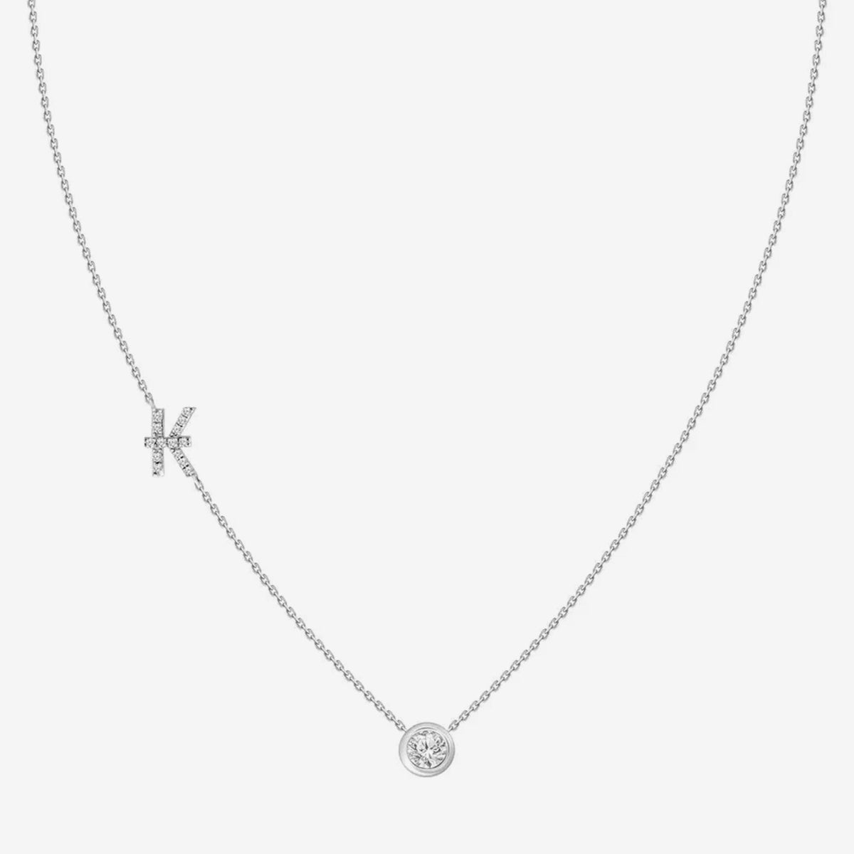 Pavé Diamond Initial Necklace, Letter K, in 18K White Gold, gray background | JJ Jewelry Miami
