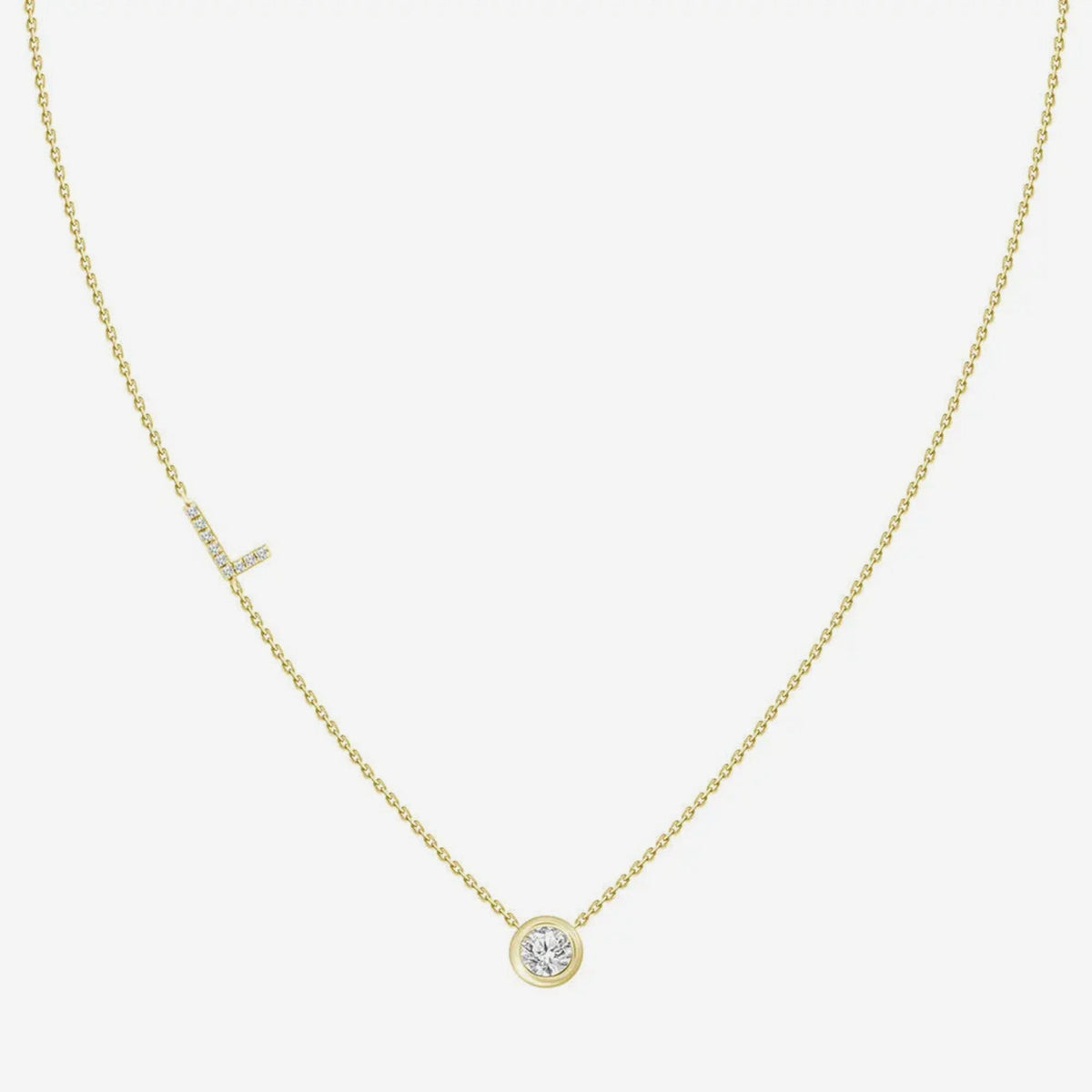 Pavé Diamond Initial Necklace, Letter L, in 18K Yellow Gold, gray background | JJ Jewelry Miami