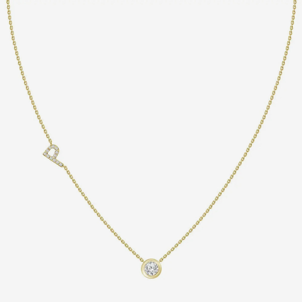 Pavé Diamond Initial Necklace, Letter P, in 18K Yellow Gold, gray background | JJ Jewelry Miami