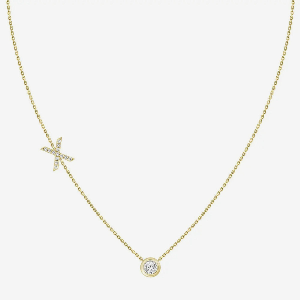 Pavé Diamond Initial Necklace, Letter X, in 18K Yellow Gold, gray background | JJ Jewelry Miami
