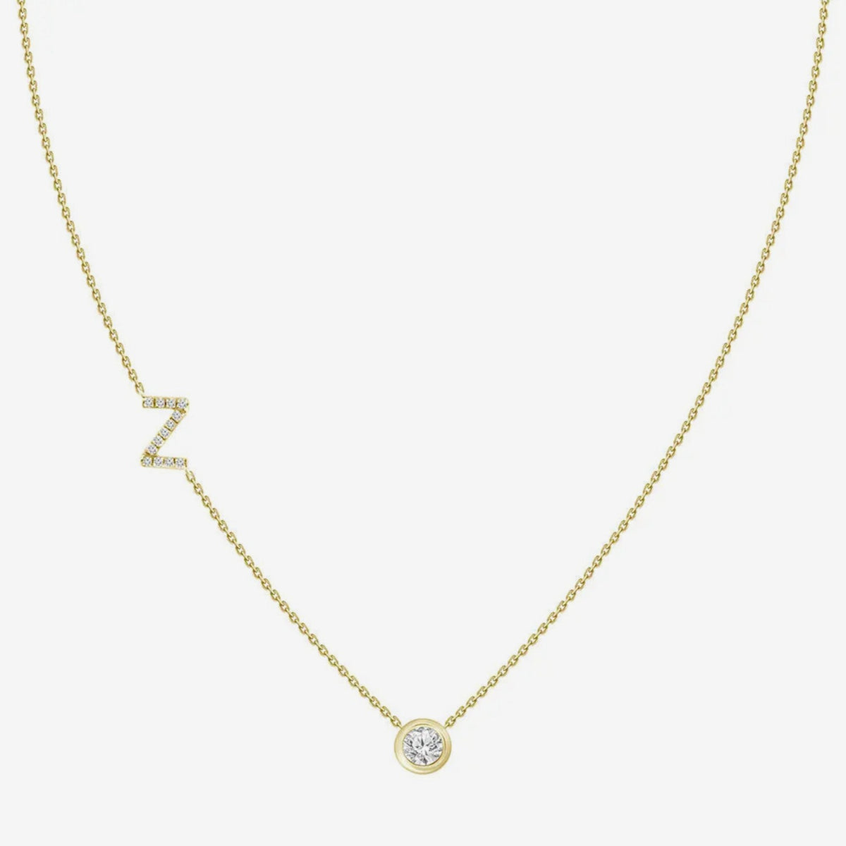 Pavé Diamond Initial Necklace, Letter Z, in 18K Yellow Gold, gray background | JJ Jewelry Miami