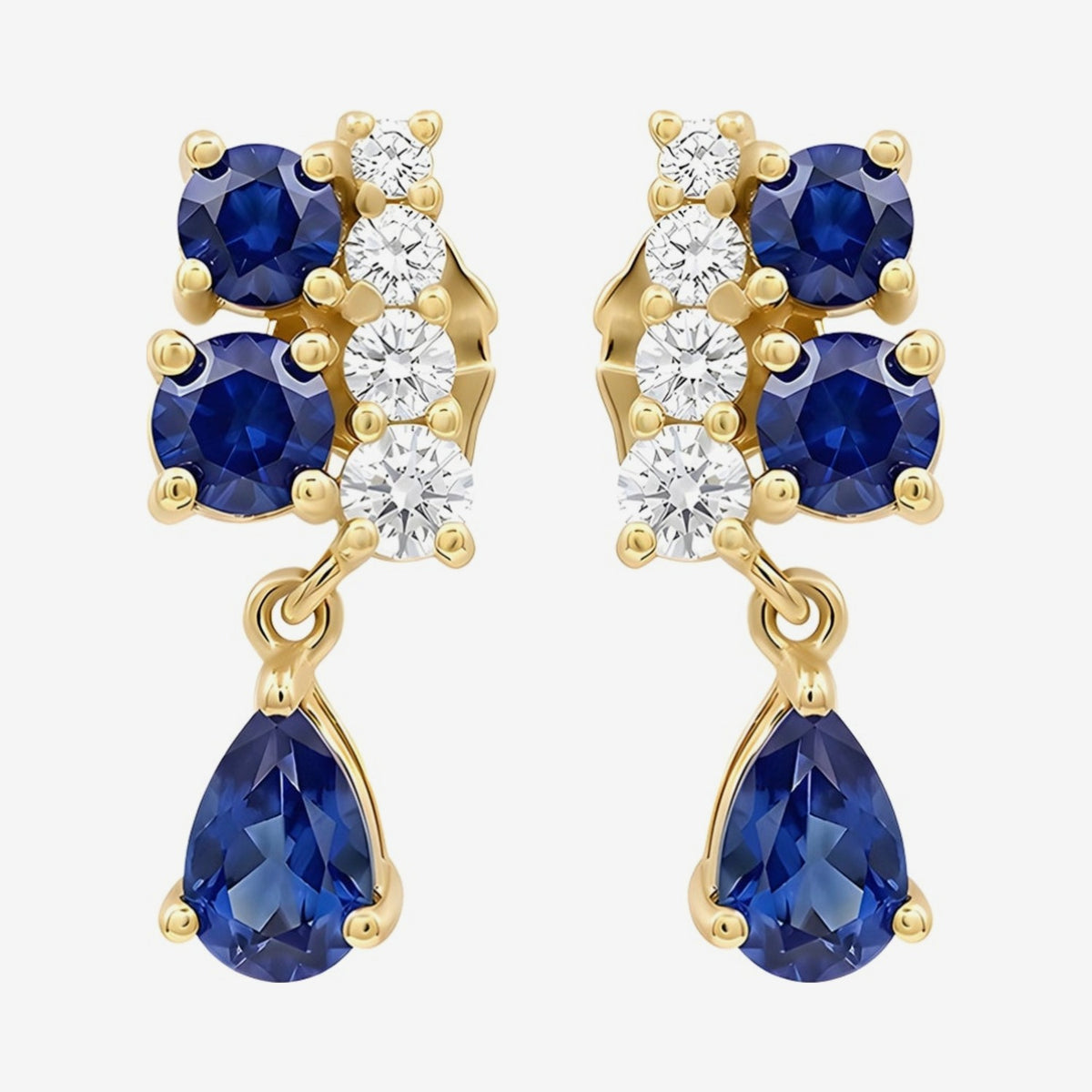 Pear-Cut Gemstone Drop Earrings in 14K Yellow Gold with Blue Sapphire, gray background | JJ Jewelry Miami