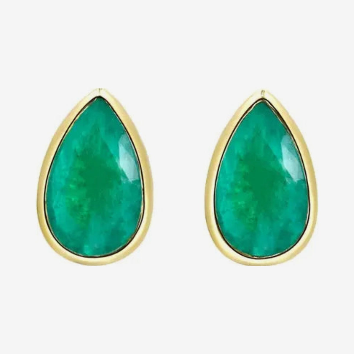 Pear Emerald Bezel Stud Earrings in 18K Yellow Gold, gray background | JJ Jewelry Miami
