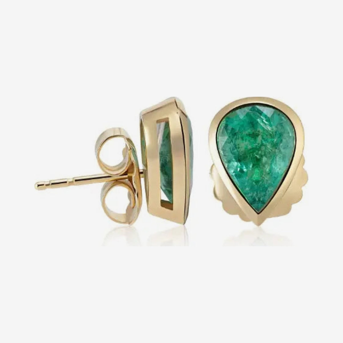 Pear-Shaped Emerald Stud Earrings in 18K Yellow Gold, gray background | JJ Jewelry Miami
