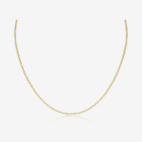 Petite Cable Chain Necklace in 14K Yellow Gold, gray background | JJ Jewelry Miami