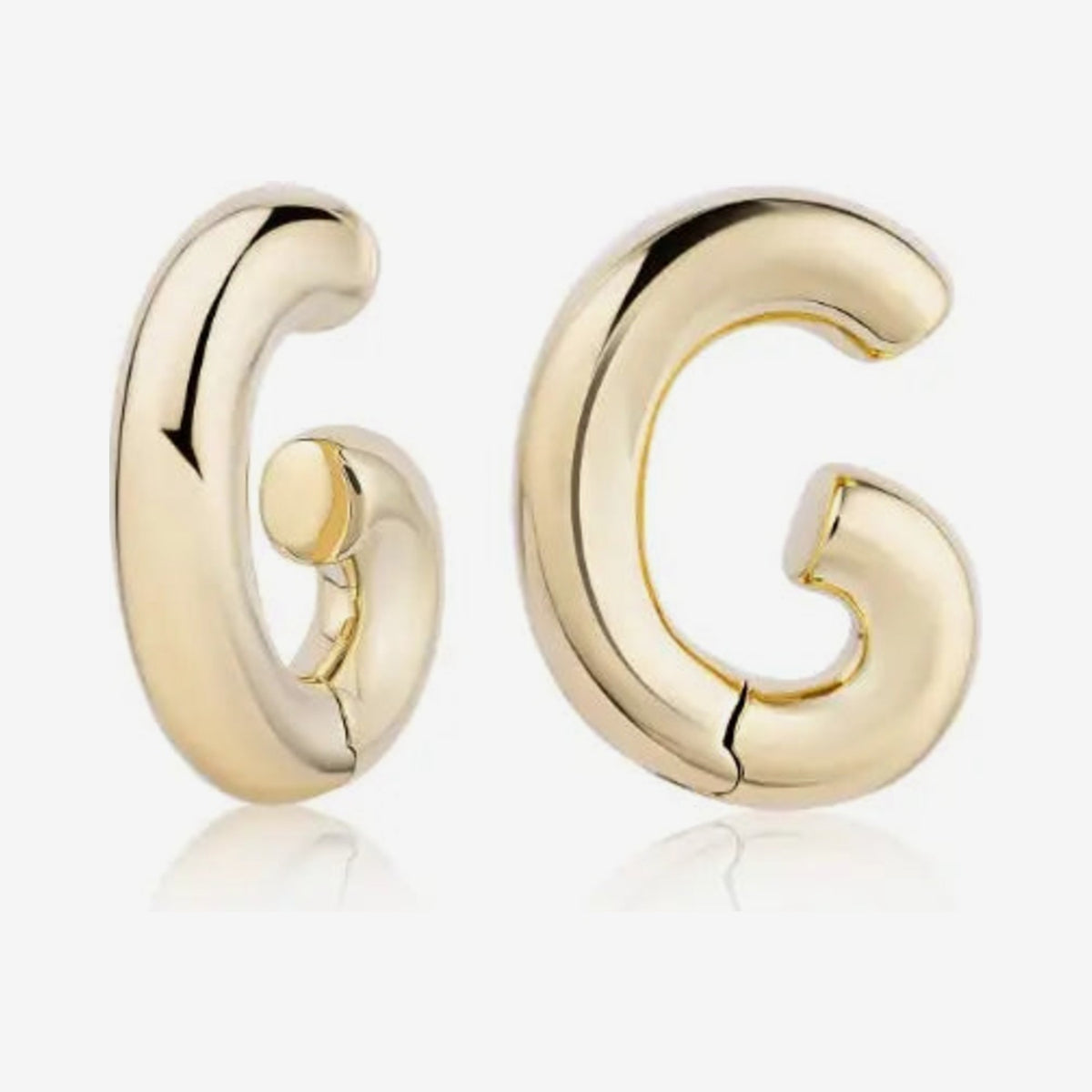 Polished Ear Cuff in 18K Yellow Gold, gray background | JJ Jewelry Miami