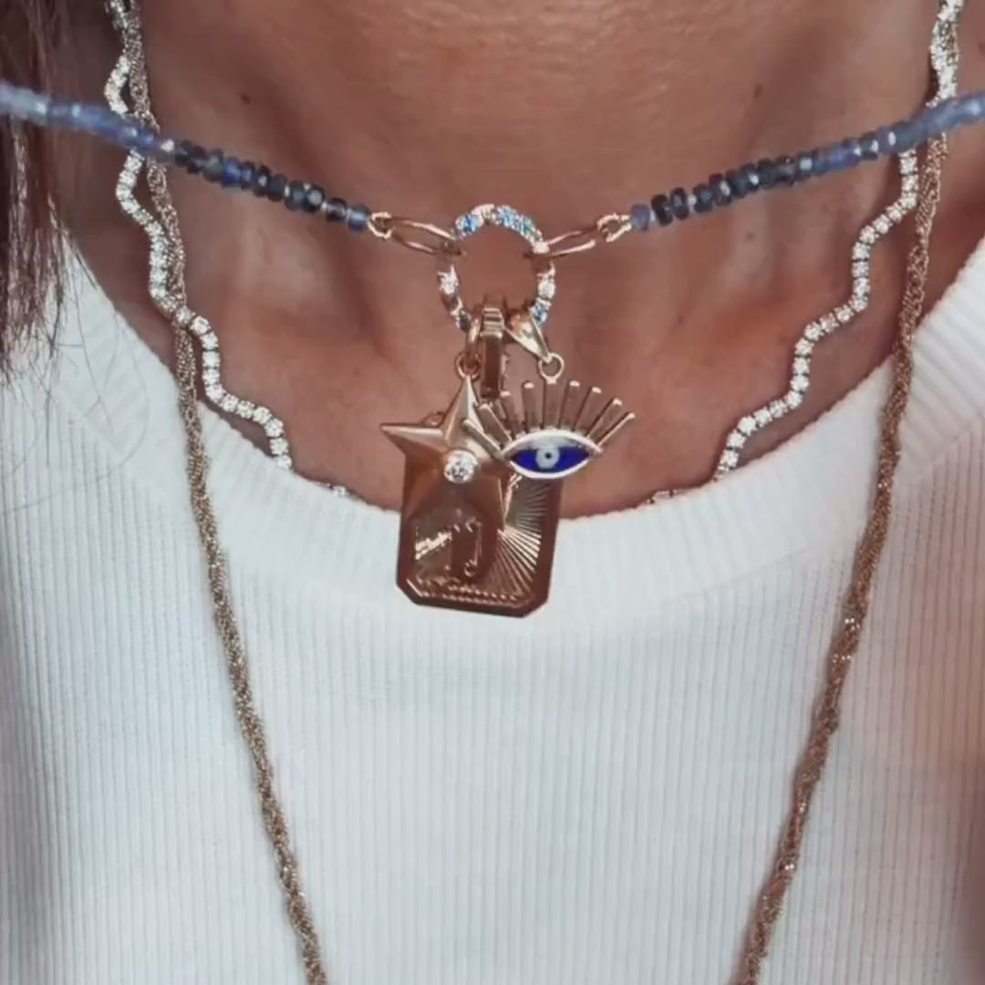 Puffed Gold Star Pendant with Diamond in 14K Yellow Gold, worn in a layered charm necklace, video | JJ Jewelry Miami