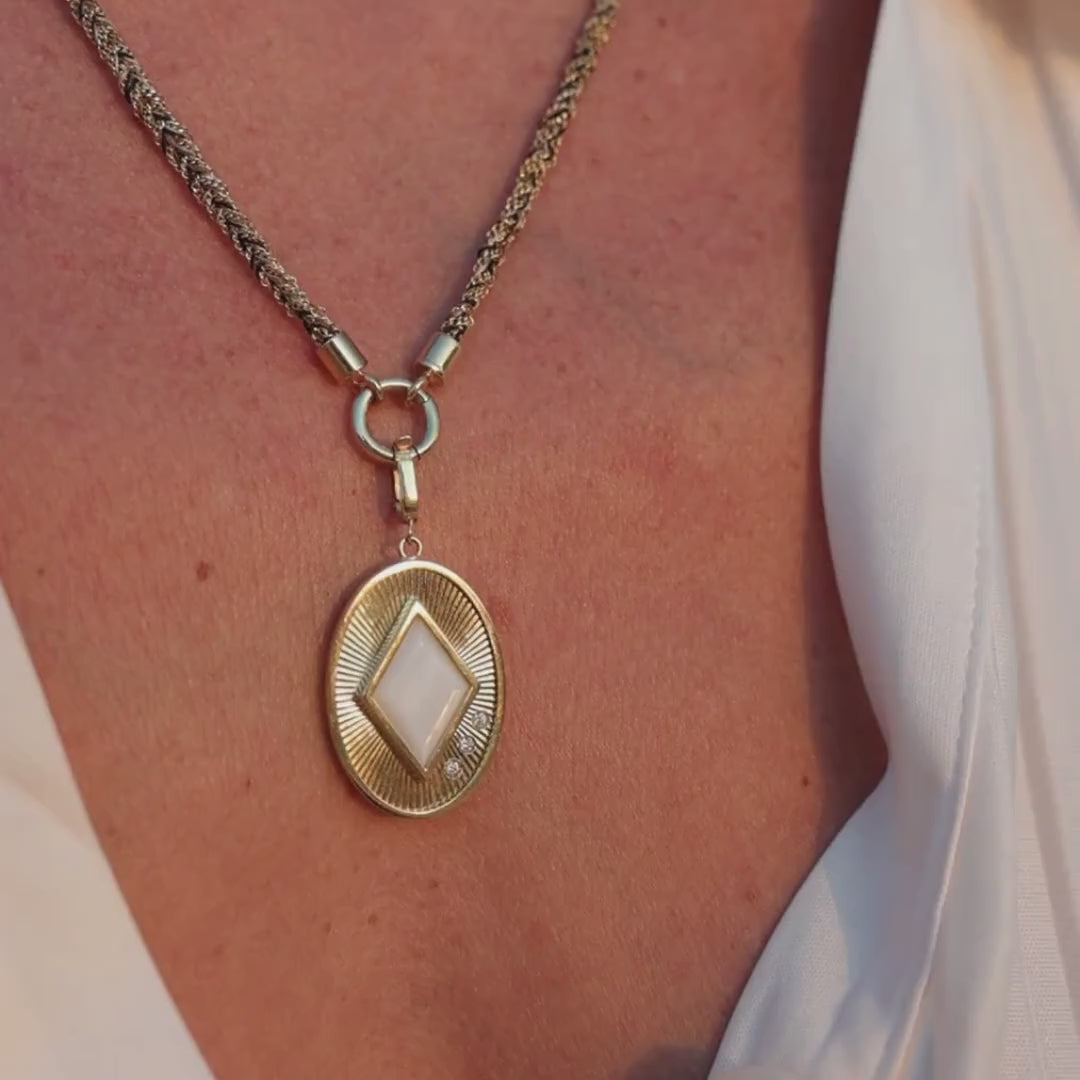 Fluted Oval Gemstone Pendant in 18K Yellow Gold, Mother of Pearl, worn on a wheat chain, video | JJ Jewelry Miami