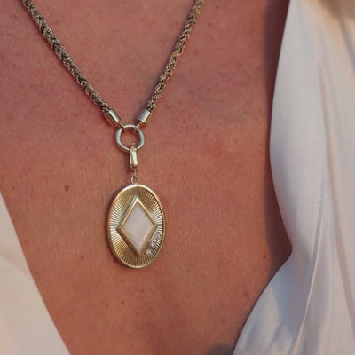 Fluted Oval Gemstone Pendant in 18K Yellow Gold, Mother of Pearl, worn on a wheat chain, video | JJ Jewelry Miami