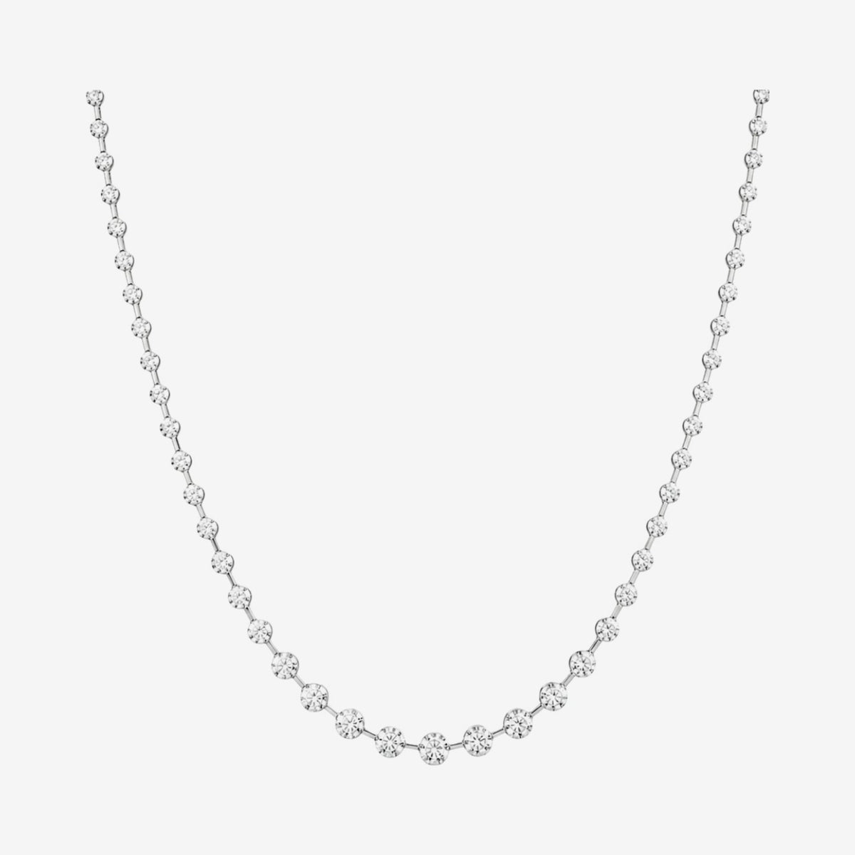 Renata Graduated Diamond Tennis Necklace in 18K Gold, gray background | JJ Jewelry Miami