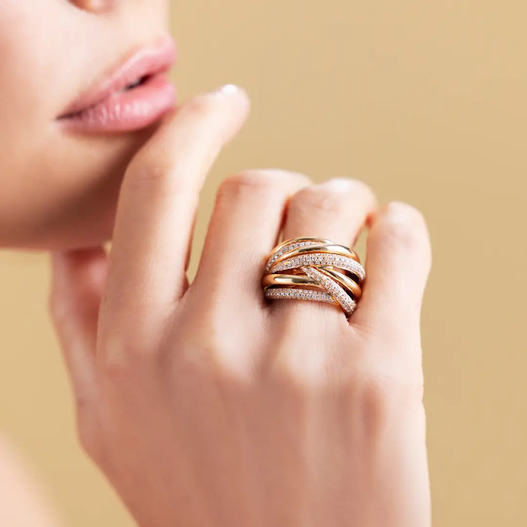 Rose gold crossover band ring with pavé diamonds