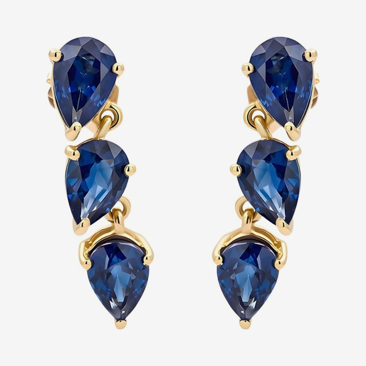 Three Pear Gemstone Dancing Earrings in 14K Yellow Gold with Blue Sapphire, gray background | JJ Jewelry Miami